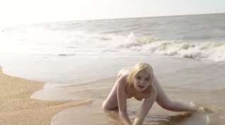 Online film Chanel Fenn alone at a beach