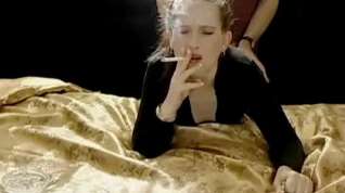 Online film Redhead gets fucked from behind while she smokes a cigarette