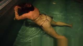 Online film Alia testing new dildo underwater.