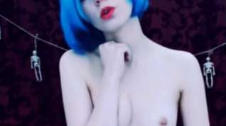 Online film Smoking teen with blue hair and tatoos