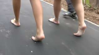Online film Girls take a barefoot walk around the city