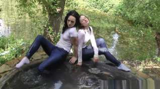 Online film Anna and Eva take bath in a pool and in a jacuzzi in tight blue jeans