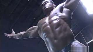 Online film big muscular daddy bodybuilder hunk posing his perfectly proportioned body