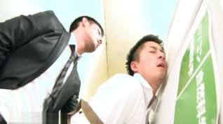 Online film jap business man cumming in library