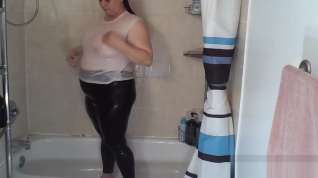 Online film Shower In White Tank Top and Black Leggings