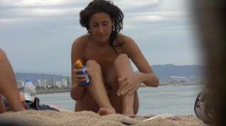Online film Hot brunette on the beach