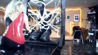 Online film Latex slave tied up in bondage