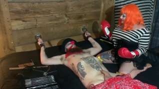 Online film Sadistic femdom kidnaps innocent clown for brutal cock and ball torture