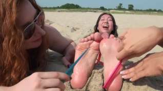 Online film Milf tickled at the beach