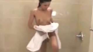 Online film Brunette taking a shower
