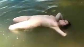 Online film Beautiful girl sexy swim in the lake