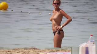 Online film Hot body brunette with perfect big tits on topless beach