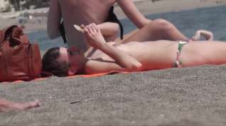 Online film Two topless girls on beach