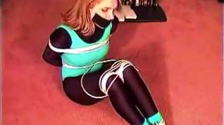 Online film Left bound and gagged in her shiny spandex by an intruder