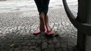 Online film Candid girl feet and soft soles in public square