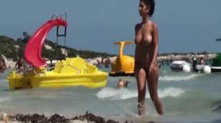 Online film Two South European babes topless on the beach