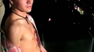 Online film Good looking young man strokes his dick on the balcony solo