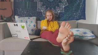 Online film Petite redhead loves teasing with her beautiful teenage feet on the sofa