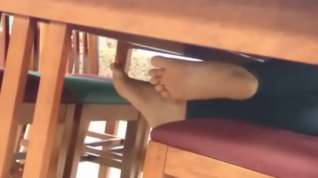 Online film Candid bare feet in library