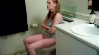 Online film voyeur spycam on toilet girl