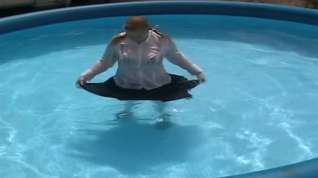 Online film Schoolgirl swimming in pool