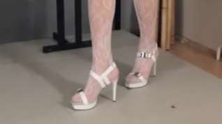 Online film White high heels crushing bugs.