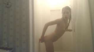 Online film Petite girlfriend fucks her dildo in the shower.