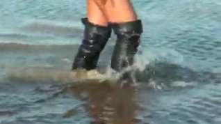 Online film Black thigh high boots in the mud