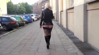 Online film Public walk in boots and vinyl skirt