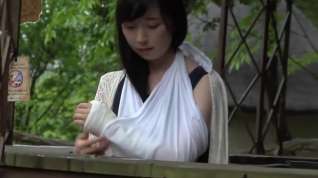 Online film Japanese girl unwraps bandage from her injured ankle