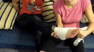 Online film girls hurting and bandaging each other's feet.