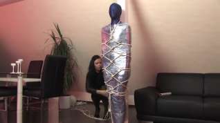 Online film Lycra and shrink wrap mummification, and rope harness