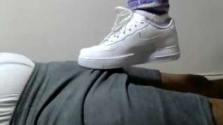 Online film Shoejob teasing in white Nike Air Force 1's low-cut