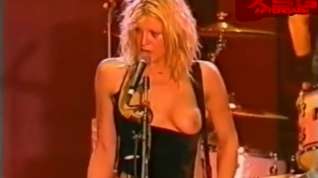 Online film Hole's Courtney Love in topless on stage at the Big Day Out 1999