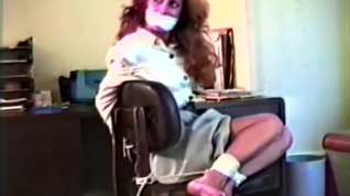 Online film Girl tied to chair