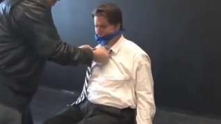 Online film BG Hot beefy executive bound, gagged and stripped