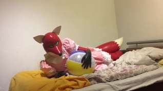 Free online porn Rubber fox maid plays with beach ball