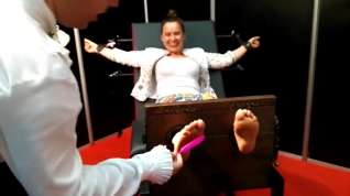 Online film Mainstream woman feet tickling in stocks