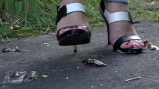 Online film Outside roach crushing in high heels.