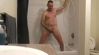 Online film Kevin Yardley shaves his dick bald and showers