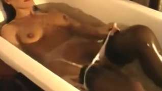 Online film Woman takes bath fully Clothed