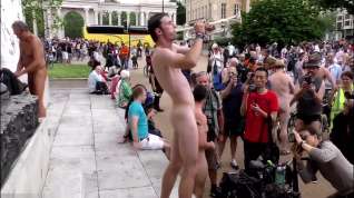 Online film Sexy naked man plays trumpet in London town square