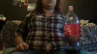 Online film Coke bloat , bursting out of button up shirt