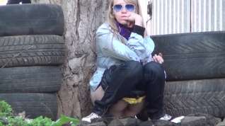 Online film Two shaved blondes take a piss outdoors