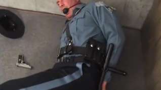 Online film DILF trooper handcuffed gagged and struggling.