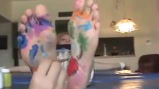 Online film feet paint tickle