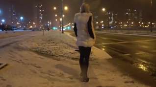 Online film Girl walking in hot leather leggins and high heels outdoor