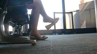Online film AWESOME barefoot flats dangle at CLE airport.