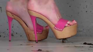 Online film Anya crushing grubs under her pink heels.