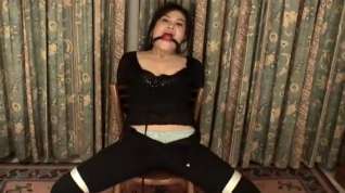 Online film Asian bondage victim bound to a chair